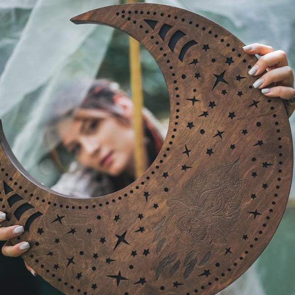 close up of front side of Nazar Crescent Waterfall Disc held close to camera 