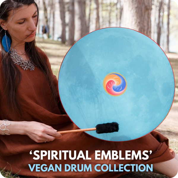sitting woman in lightly wooded area holding Nazar Vegan Drum with cosmic unity symbol on a light blue background